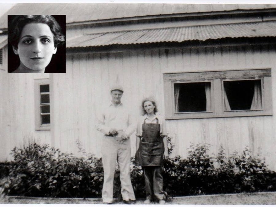 Two people standing in front of the Laura Riding Jackson home and inset photo of Laura Riding Jackson in upper left